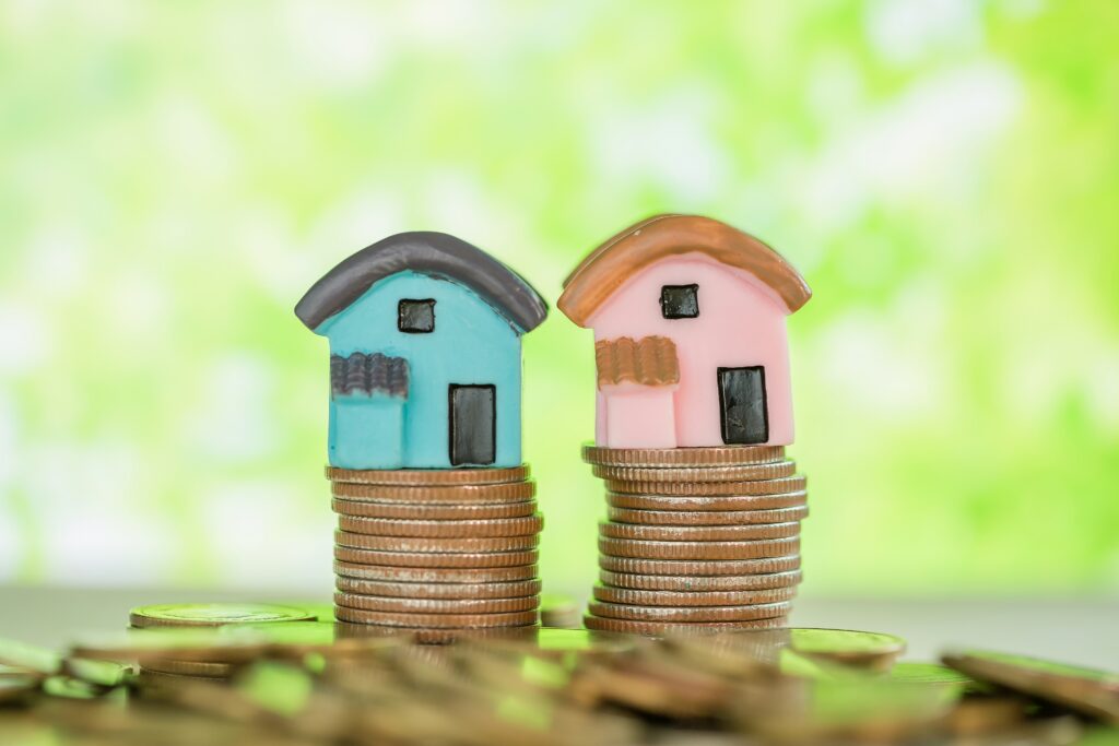 An image showing two houses in the article: Home Loans And Loans Against Property